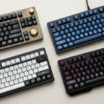 A top-down view of four different mechanical keyboards, showcasing a variety of styles and sizes available for beginners entering the keyboard hobby.